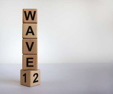 Symbol for a second wave of the corona virus. Cube with the changed the expression '1 wave' to '2...