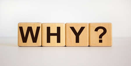 Concept word 'why' on wooden cubes on a beautiful white background. Business concept, copy space.の写真素材