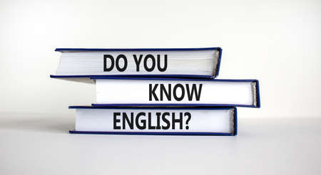 Do you know english symbol. Books with words 'Do you know english'. Beautiful white background. Business, education and do you know english concept, copy space.の写真素材