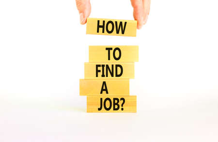 How to find a job symbol. Concept words How to find a job on wooden blocks on a beautiful white table white background. Businessman hand. Business and how to find a job concept. Copy space.の写真素材