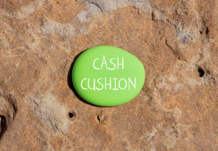 Cash cushion symbol. Concept words Cash cushion on beautiful green stone. beautiful stone background. Business and cash cushion concept. copyspace.の写真素材