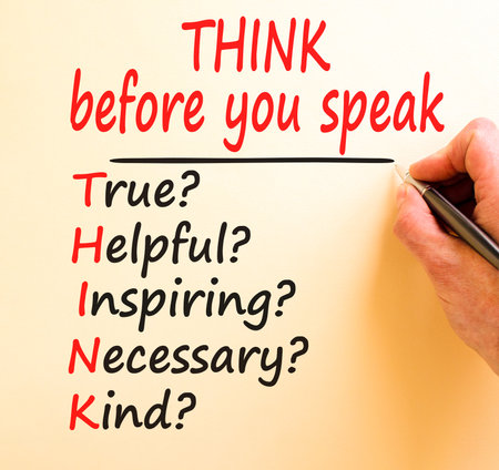Think before you speak symbol. Concept words Think before you speak true helpful inspiring necessary kind on white paper. Beautiful brown background. Business Think before you speak concept.の写真素材