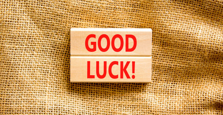 Good luck symbol. Concept words Good luck on beautiful wooden block. Beautiful canvas table canvas background. Business, motivational good luck concept. Copy space.の写真素材