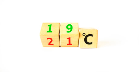 19 or 21 degrees Celsius symbol. Concept word 19 or 21 degrees Celsius on cubes. Beautiful white...
