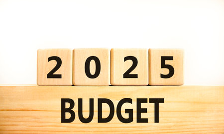 Planning 2025 budget new year symbol. Concept words 2025 Budget on beautiful wooden blocks....