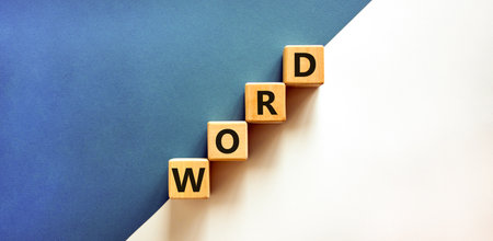 Word symbol. Concept word Word on beautiful wooden blocks. Beautiful white and blue background. Business, lifestyle, support and word concept. Copy space.の写真素材