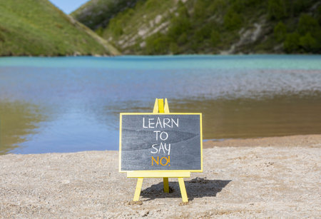 Learn to say no symbol. Concept words phrase Learn to say no on beautiful black blackboard....