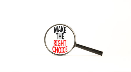 Make the right choice symbol. Concept words phrase Make the right choice in beautiful black magnifying glass. Beautiful white background. Business Make the right choice concept. Copy space.の写真素材