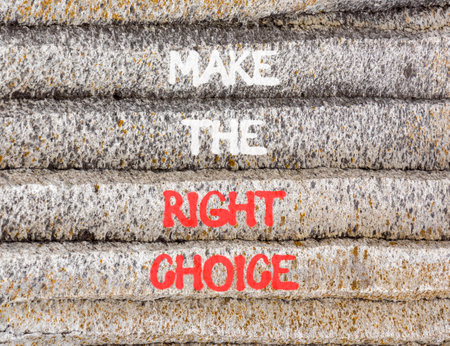 Make the right choice symbol. Concept words phrase Make the right choice on beautiful gray stone wall. Beautiful stone wall background. Business Make the right choice concept. Copy space.の写真素材