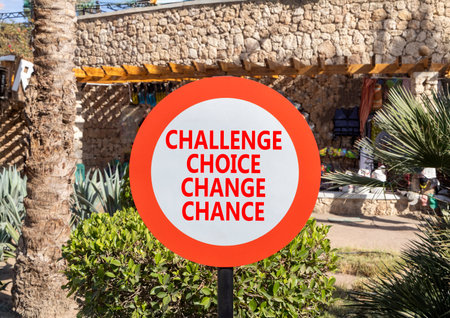 Challenge choice change chance symbol. Concept words Challenge choice change chance on beautiful road sign. Beautiful palm tree background. Business Challenge choice change chance concept. Copy space.の写真素材