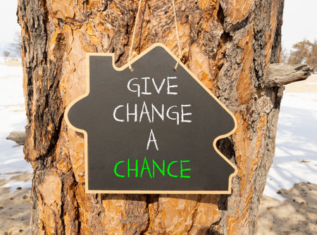 Give change a chance symbol. Concept words phrase Give change a chance on beautiful black...