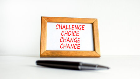 Challenge choice change chance symbol. Concept words Challenge choice change chance on wooden picture frame. Beautiful white background. Business Challenge choice change chance concept. Copy space.の写真素材