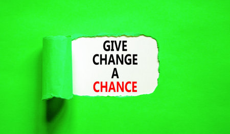 Give change a chance symbol. Concept words phrase Give change a chance on beautiful white paper. Beautiful green paper background. Business Give change a chance concept. Copy space.の写真素材