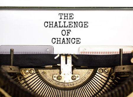 The challenge of chance symbol. Concept words phrase The challenge of chance typed on beautiful retro old typewriter. Beautiful white background. Business The challenge of chance concept. Copy space.の写真素材