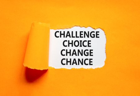 Challenge choice change chance symbol. Concept words Challenge choice change chance on beautiful white paper. Beautiful orange background. Business Challenge choice change chance concept. Copy space.の写真素材