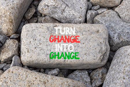 Turn change into chance symbol. Concept words phrase Turn change into chance on beautiful gray...