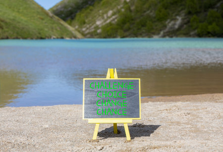 Challenge choice change chance symbol. Concept words Challenge choice change chance on beautiful blackboard. Beautiful mountain background. Business Challenge choice change chance concept. Copy space.の写真素材