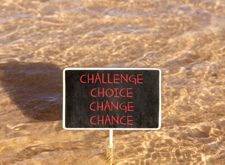 Challenge choice change chance symbol. Concept words Challenge choice change chance on beautiful blackboard. Beautiful sea water background. Business Challenge choice change chance concept. Copy spaceの写真素材