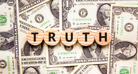 Truth symbol. Concept word Truth on beautiful wooden circles. Beautiful dollar bills. Beautiful background from dollar bills. Business lifestyle truth concept. Copy space.の写真素材