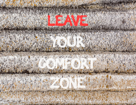 Leave your comfort zone symbol. Concept words Leave your comfort zone on beautiful gray stone wall. Beautiful stone wall background. Business psychological Leave your comfort zone concept. Copy space.の写真素材