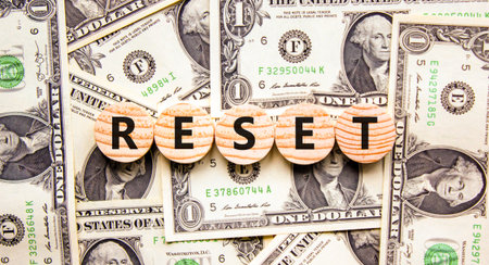 Reset symbol. Concept word Reset on beautiful wooden circles. Beautiful dollar bills. Beautiful background from dollar bills. Business lifestyle reset concept. Copy space.の写真素材