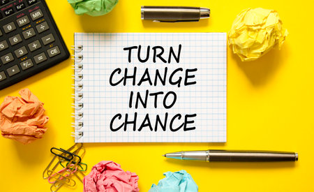 Turn change into chance symbol. Concept words phrase Turn change into chance on beautiful note. Colored paper. Beautiful yellow background. Business Turn change into chance concept. Copy space.の写真素材