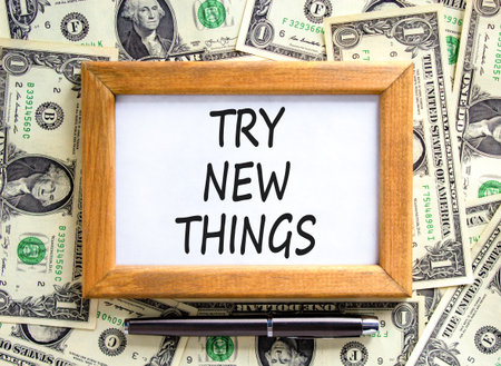 Try new things symbol. Concept words Try new things on beautiful picture frame. Black pen. Beautiful...