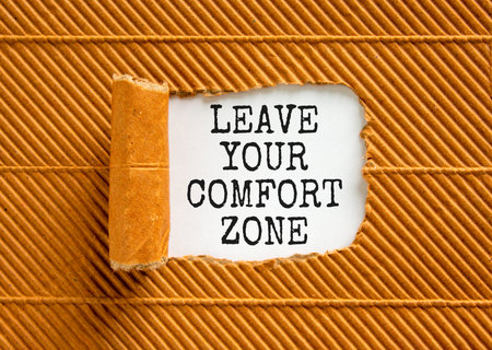 Leave your comfort zone symbol. Concept words Leave your comfort zone on beautiful white paper. Beautiful brown paper background. Business psychological Leave your comfort zone concept. Copy space.の写真素材