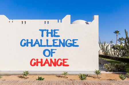 The challenge of chance symbol. Concept words phrase The challenge of chance on beautiful white wall. Beautiful white wall and blue sky background. Business The challenge of chance concept. Copy spaceの写真素材