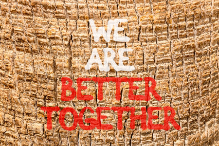 We are better together symbol. Concept words phrase We are better together on beautiful palm tree...