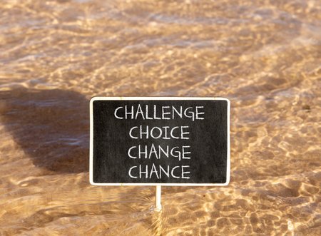 Challenge choice change chance symbol. Concept words Challenge choice change chance on beautiful blackboard. Beautiful sea water background. Business Challenge choice change chance concept. Copy spaceの写真素材