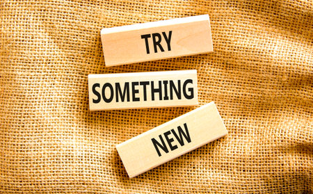 Try something new symbol. Concept words Try something new on beautiful block. Beautiful canvas table canvas background. Business motivational lifestyle try something new concept. Copy space.の写真素材