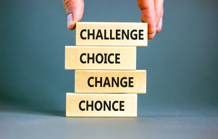 Challenge choice change chance symbol. Concept words Challenge choice change chance on beautiful wooden blocks. Beautiful gray background. Business Challenge choice change chance concept. Copy space.の写真素材