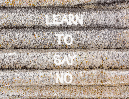 Learn to say no symbol. Concept words phrase Learn to say no on beautiful gray stone wall. Beautiful stone wall background. Business psychological Learn to say no concept. Copy space.の写真素材
