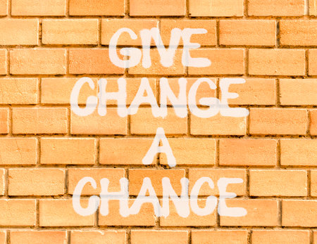 Give change a chance symbol. Concept words phrase Give change a chance on beautiful brown brick wall. Beautiful brown brick wall background. Business Give change a chance concept. Copy space.の写真素材