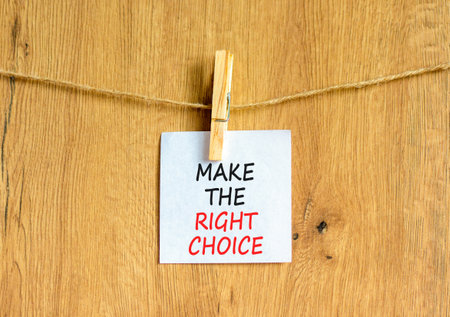 Make the right choice symbol. Concept words phrase Make the right choice on beautiful white paper on...