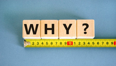 Why question symbol. Concept word Why question on beautiful wooden blocks. Beautiful yellow ruler....