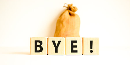 Bye symbol. Concept word Bye on beautiful wooden blocks. Beautiful canvas bag. Beautiful white table...