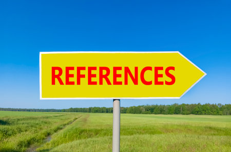 References or reference symbol. Concept word References on beautiful yellow road sign. Beautiful blue sky green grass peaceful nature background Business references or reference concept Copy spaceの写真素材