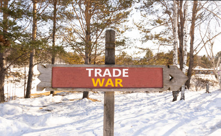 Trade war symbol. Concept word Trade war on beautiful wooden road sign. Beautiful snow winter forest...