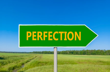Perfection symbol. Concept word Perfection on beautiful green road sign. Beautiful blue sky green...