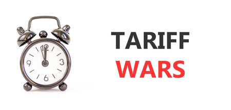 Trade tariff wars symbol. Concept word Tariff wars on beautiful white paper. Beautiful black alarm...