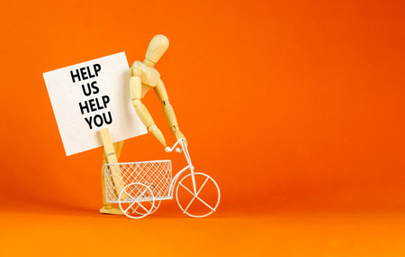 Help you symbol. Concept words phrase Help us help you on beautiful white paper on wooden...