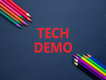 Tech demo symbol. Concept word Tech demo on beautiful black paper. Colored pencils. Beautiful black...