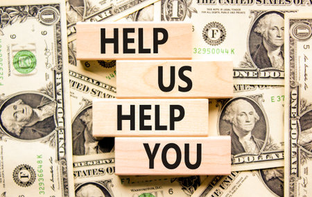Help you symbol. Concept words phrase Help us help you on beautiful wooden blocks. Dollar bills. Beautiful dollar bills background. Business Help you concept. Copy space.の写真素材
