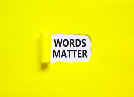 Words matter symbol. Concept word Words matter on beautiful white paper. Beautiful yellow paper background. Business words matter concept. Copy space.の写真素材