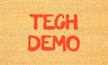 Tech demo symbol. Concept word Tech demo on beautiful brown brick wall. Beautiful brown brick wall...