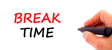 Break time symbol. Concept Break word time on beautiful white paper. Businessman's hand with pen....