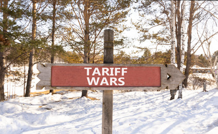 Trade tariff wars symbol. Concept word Tariff wars on beautiful wooden road sign. Beautiful snow...
