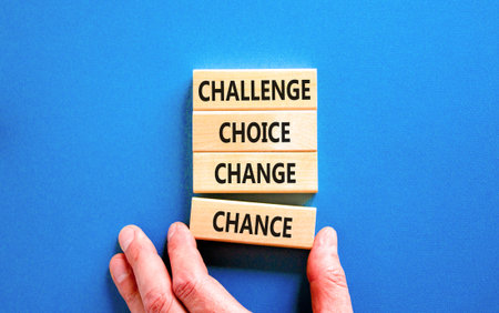 Challenge choice change chance symbol. Concept words Challenge choice change chance on beautiful wooden blocks. Beautiful blue background. Business Challenge choice change chance concept. Copy space.の写真素材